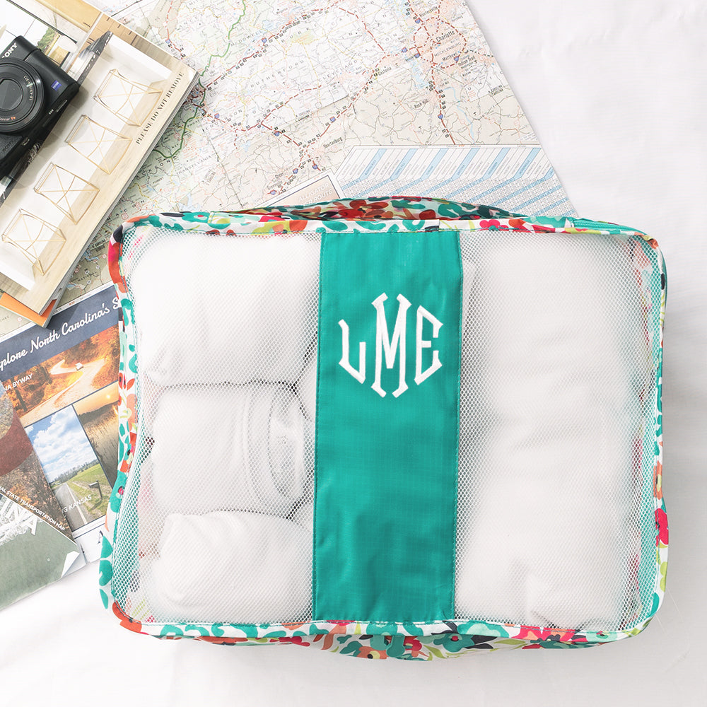 wild blooms packing bag with map and camera