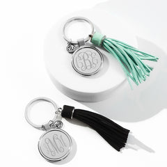 monogrammed tassel key chains in black and mint
