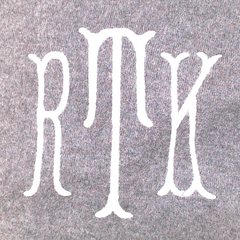 BLOOPER CLOTHING: Monogrammed Asymmetrical Turtleneck Tunic