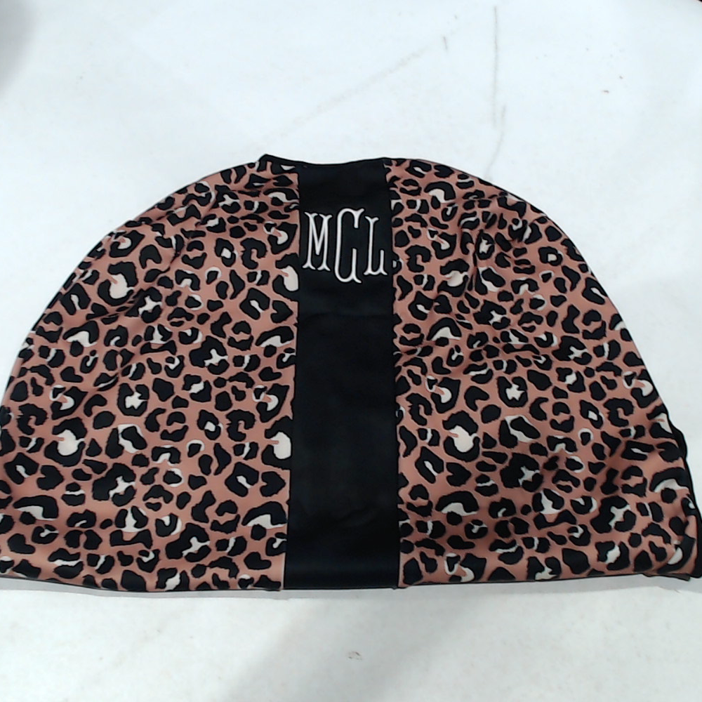 BLOOPER ACCESSORY: Monogrammed Luggage Cover