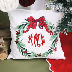 holiday wreath pillow with red monogram