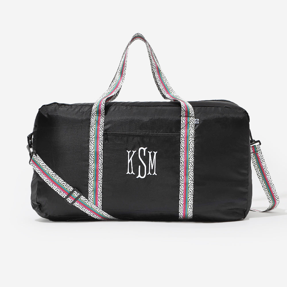 monogrammed packable weekender in black spottie
