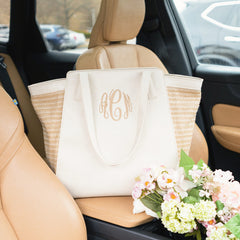 bone tropical travel tote in car