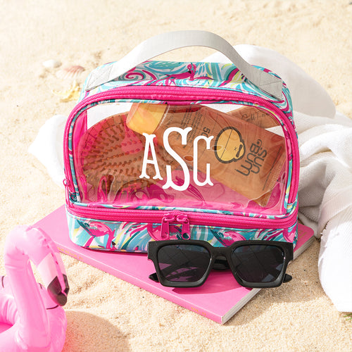 dual compartment cosmetic bag on sand