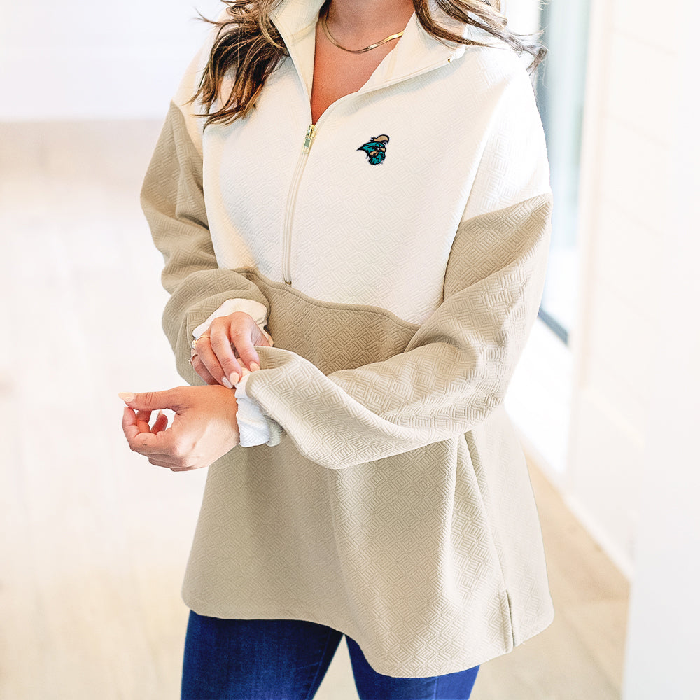 close up of coastal carolina tan quilted pullover tunic