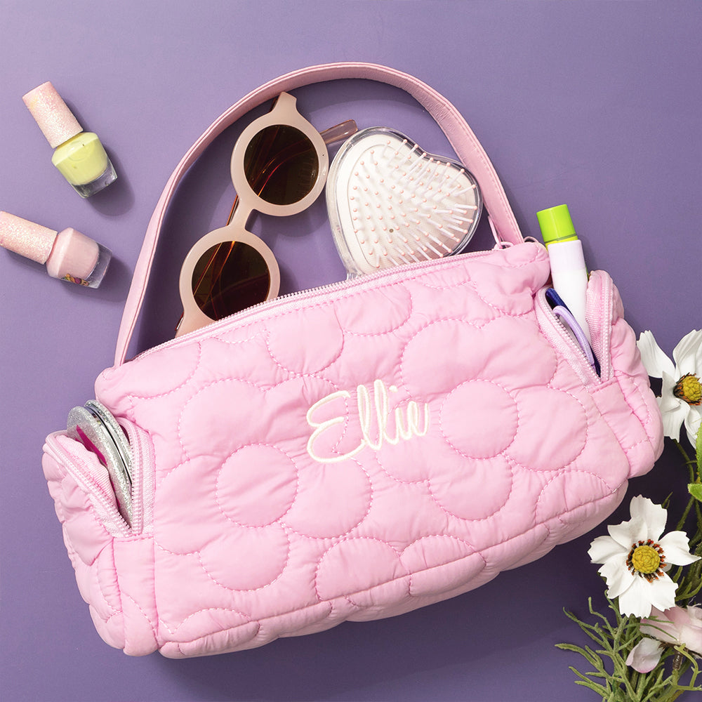 pink girls shoulder bag flatlay