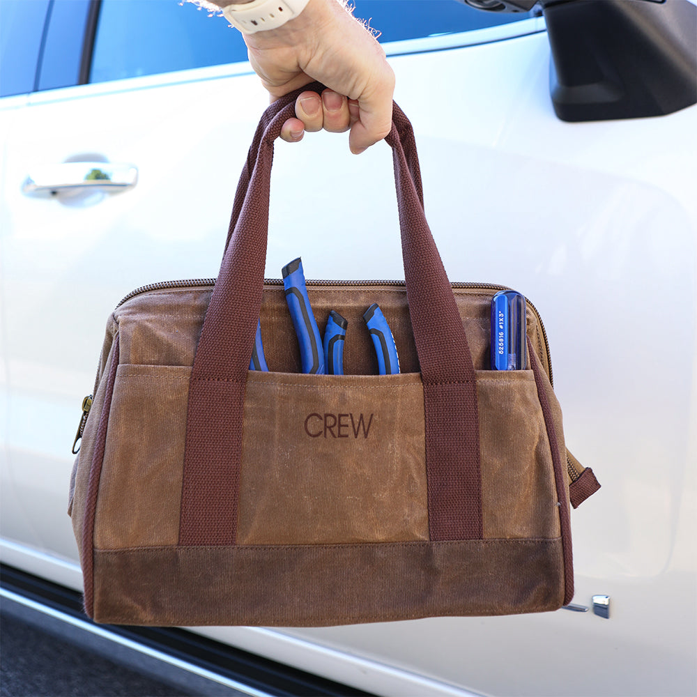 man holding personalized tool bag