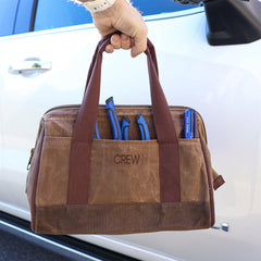 man holding personalized tool bag