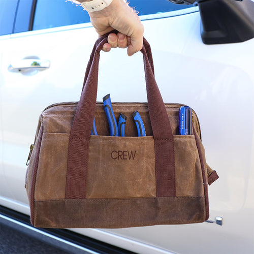 man holding personalized tool bag
