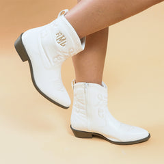 Boots on a girls leg in the studio